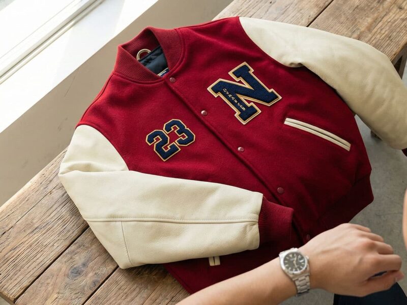 close-up of men’s letterman jacket materials and chenille patches