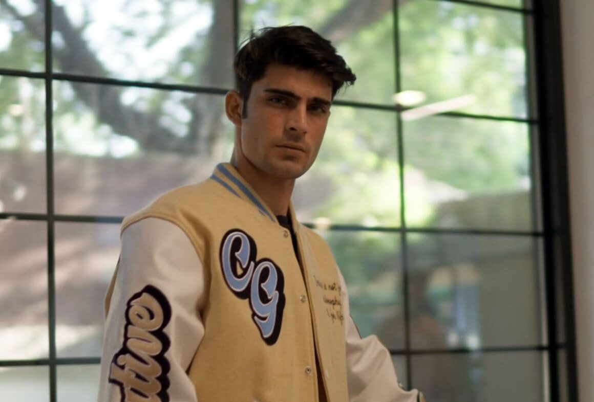 Wool & Leather Varsity Jacket, Model Wearing Clothoo made Jacket.