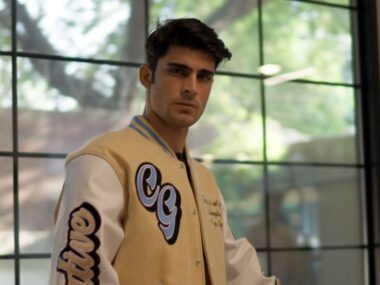 Wool & Leather Varsity Jacket, Model Wearing Clothoo made Jacket.