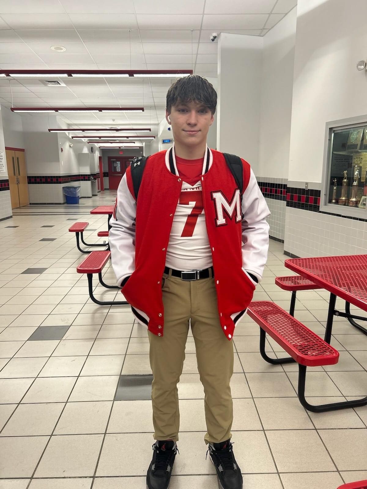 Student Wearing Custom Varsity Jacket Clothoo