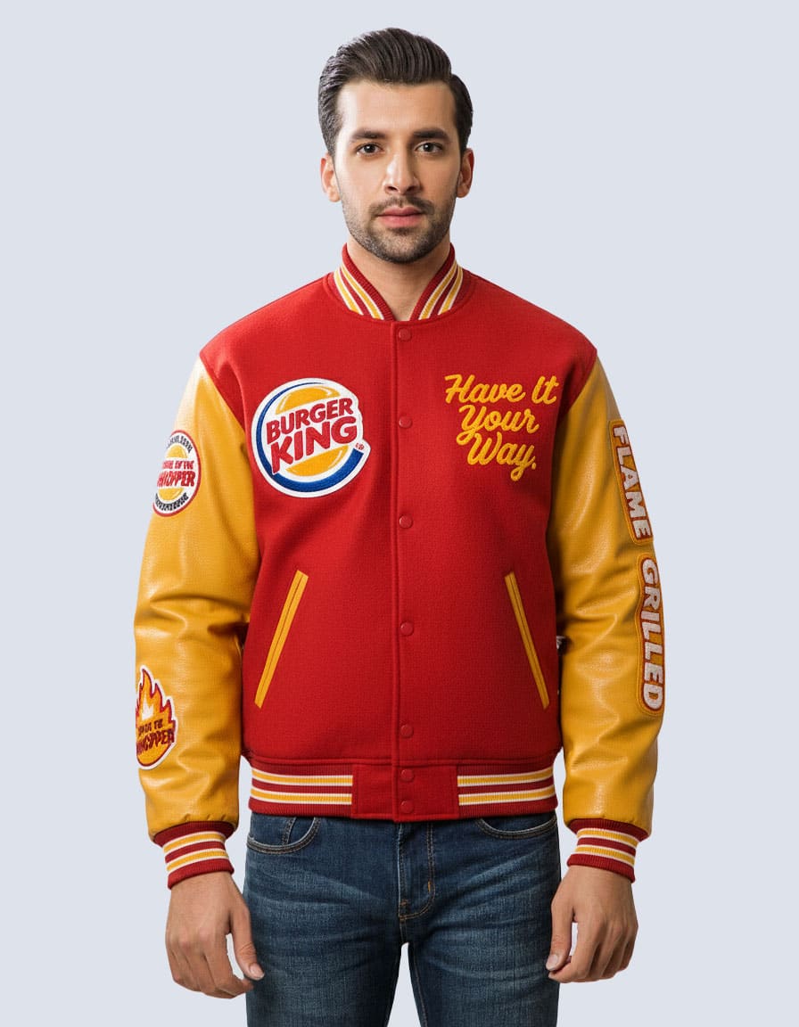 High school students wearing school letterman jackets with mascot and graduation year patches